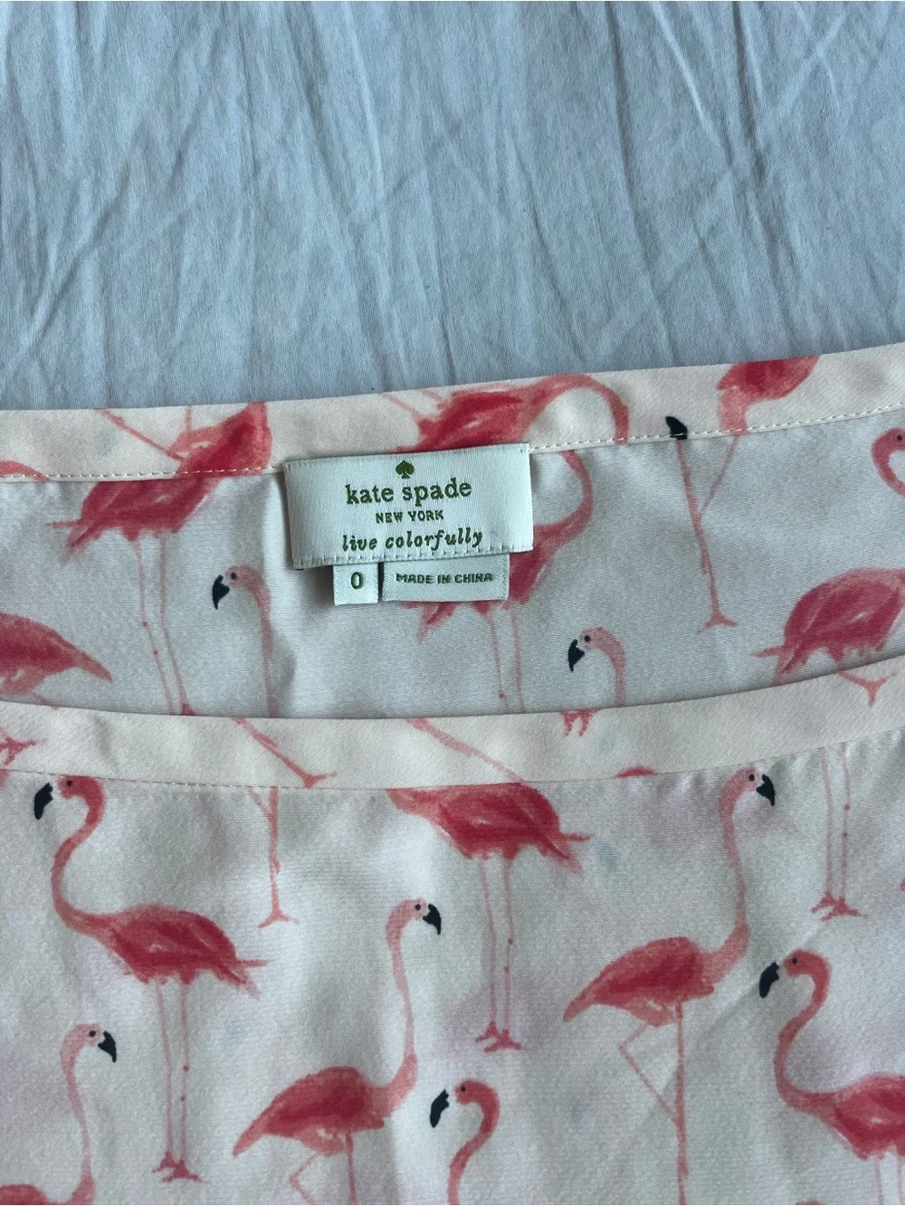 kate spade cream top with pink flamingo print
